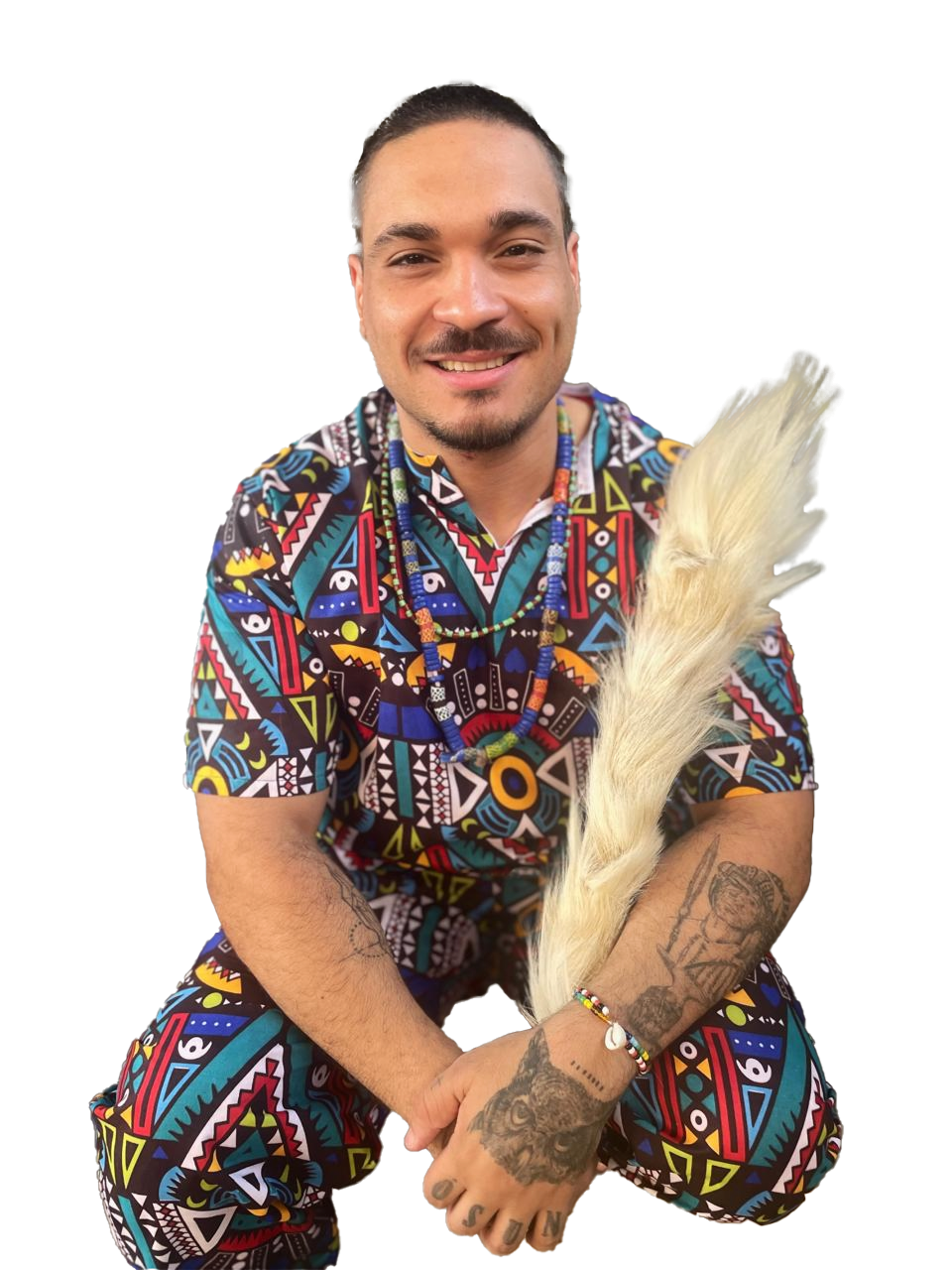 Pai Tumbi consultando búzios